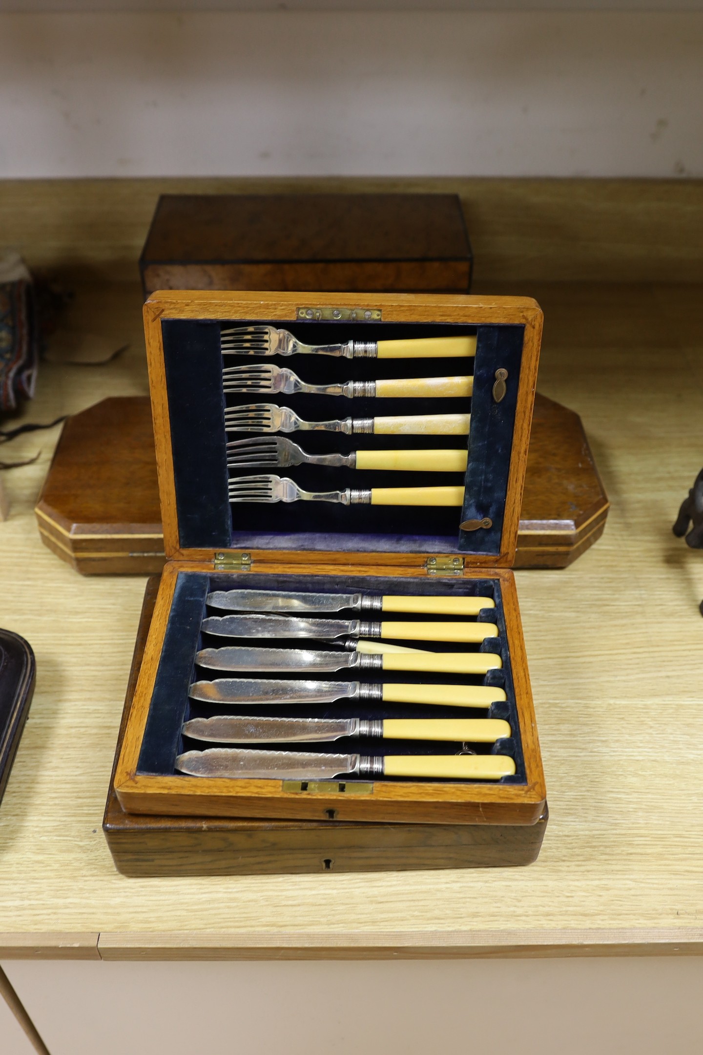 Four cased plated sets and a 19th-century burr walnut box